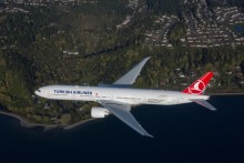 Turkish Airlines Boeing 777-300ER photographed on 6 April 2015 from Wolfe Air Aviation Learjet 25B by Chad Slattery.