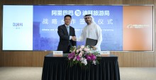 Issam Kazim, CEO of DCTCM and Jerry Hu, VP of Fliggy and Alibaba Group at the signing of MoU