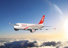 Air Arabia airplane-above-clouds